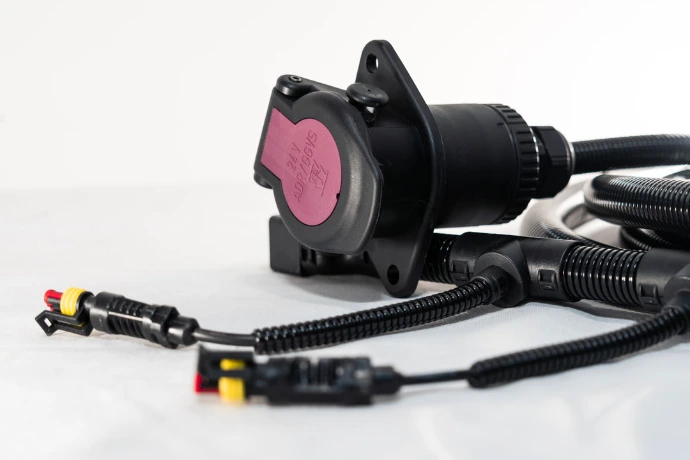 Cable assembly with multiple overmoulded connectors