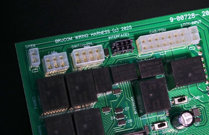 PCB with through-hole and surface mount population and Brucom branding