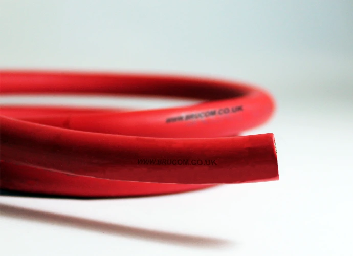 Open ended red power cable with brucom branding.