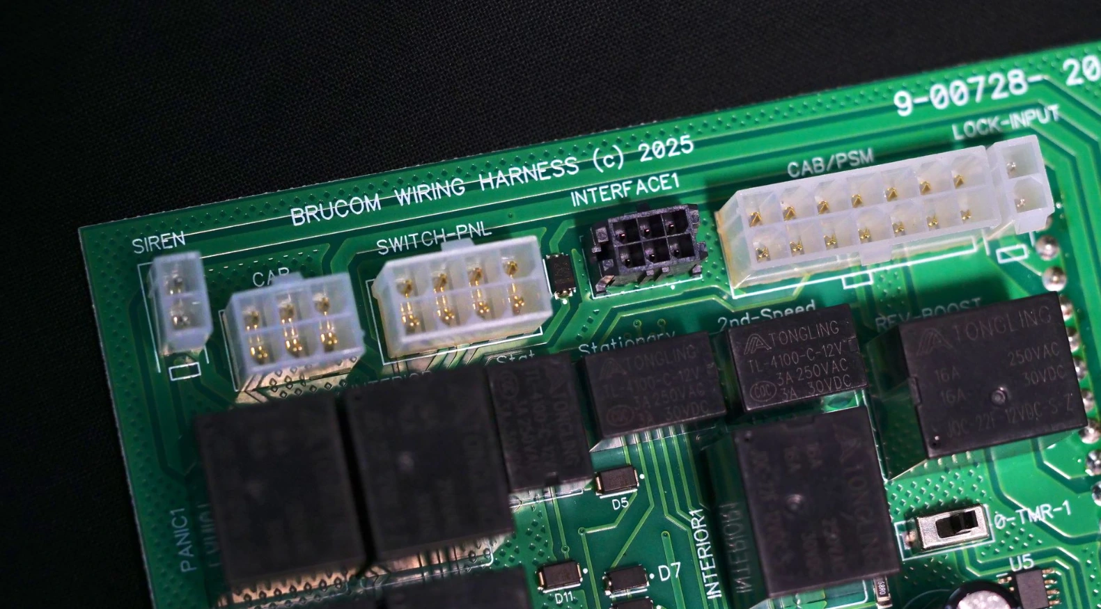 PCB with through-hole and surface mount population and Brucom branding