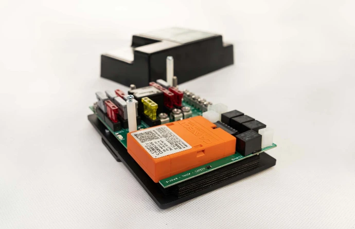 Internal look at a fuse box with PCB and fuses attached