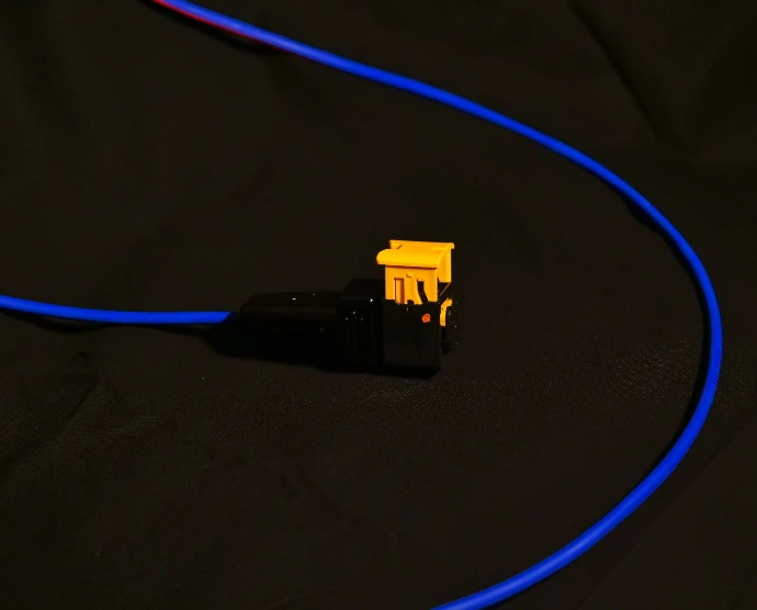 overmoulded connector attached to a simple blue wire